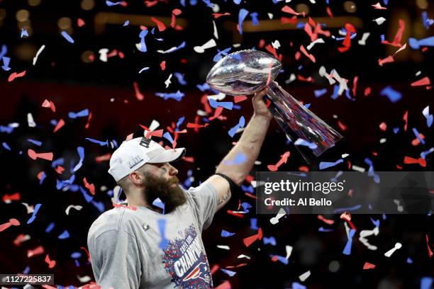 Julian Edelman of the New England Patriots celebrates with the Vince Lombardi Trophy after his teams 13-3 win over the Los Angeles Rams during Super...