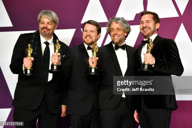 Ian Hunter, J.D. Schwalm, Paul Lambert, and Tristan Myles, winners of Best Visual Effects for 'First Man' pose in the press room during at Hollywood...