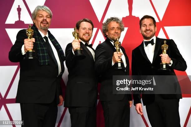 Ian Hunter, J.D. Schwalm, Paul Lambert, and Tristan Myles, winners of Best Visual Effects for 'First Man' pose in the press room during at Hollywood...