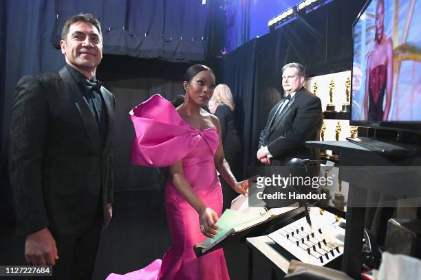 In this handout provided by A.M.P.A.S., Javier Bardem and Angela Bassett pose backstage during the 91st Annual Academy Awards at the Dolby Theatre on...