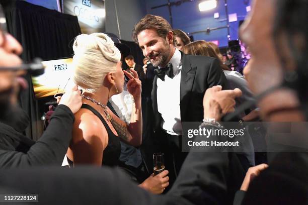 In this handout provided by A.M.P.A.S., Lady Gaga and Bradley Cooper pose backstage during the 91st Annual Academy Awards at the Dolby Theatre on...