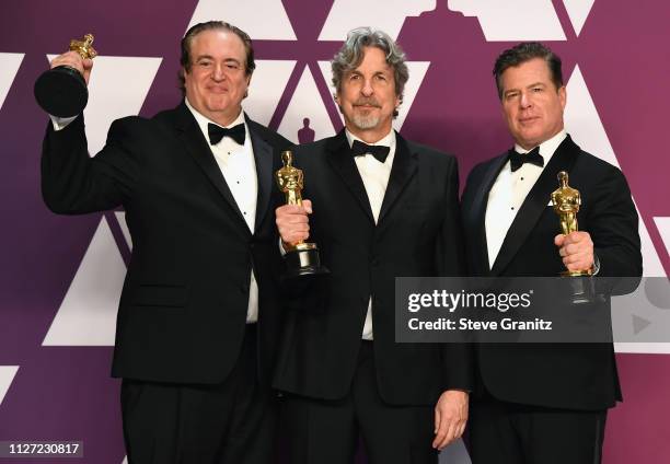 Nick Vallelonga, Peter Farrelly and Brian Currie, winners Best Original Screenplay award for 'Green Book' poses in the press room during at Hollywood...