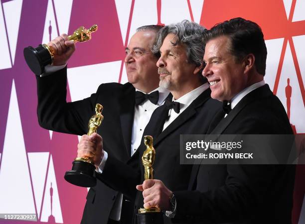 Nick Vallelonga, Peter Farrelly and Brian Currie, winners Best Original Screenplay award for "Green Book" pose in the press room during the 91st...
