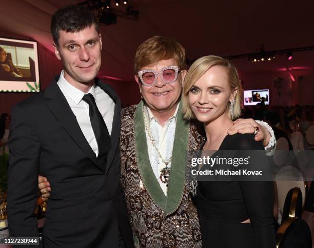 James Heerdegen, Sir Elton John, and Christina Ricci attend the 27th annual Elton John AIDS Foundation Academy Awards Viewing Party sponsored by IMDb...