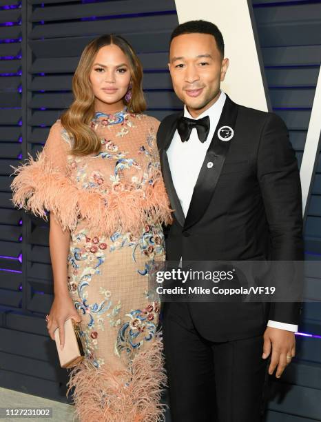 Chrissy Teigen and John Legend attend the 2019 Vanity Fair Oscar Party hosted by Radhika Jones at Wallis Annenberg Center for the Performing Arts on...