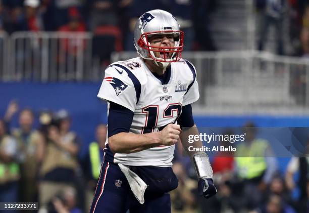 Tom Brady of the New England Patriots celebrates his teams fourth quarter touchdown against the Los Angeles Rams during Super Bowl LIII at...