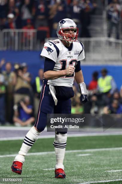 Tom Brady of the New England Patriots celebrates his teams fourth quarter touchdown against the Los Angeles Rams during Super Bowl LIII at...