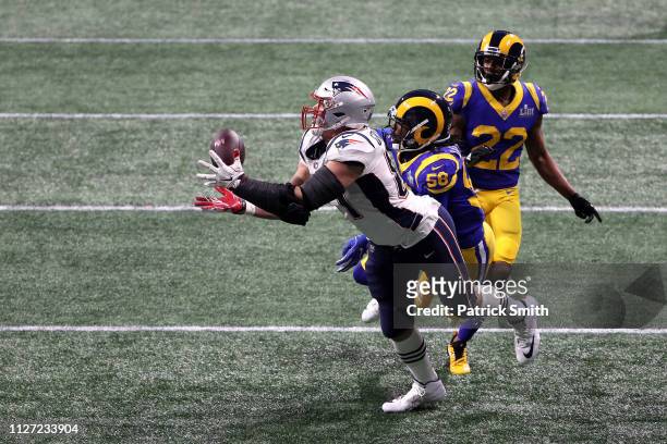 Rob Gronkowski of the New England Patriots catches a 29-yard reception in the fourth quarter against the Los Angeles Rams during Super Bowl LIII at...