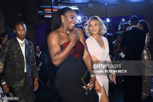 Singer-songwriter Pharrell Williams and US tennis player Serena Williams attend the 91st Annual Academy Awards Governors Ball at the Hollywood &...