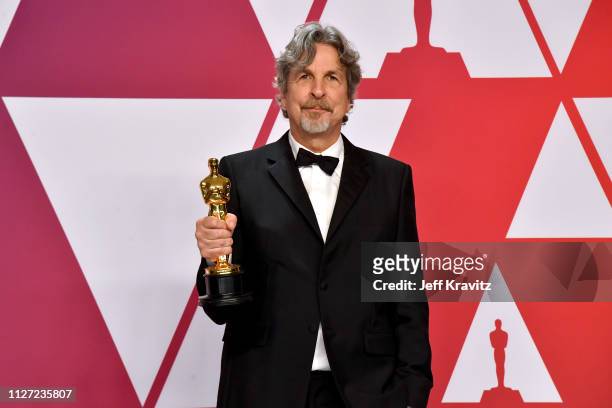 Director Peter Farrelly poses with the Best Picture and Best Original Screenplay award for "Green Book" in the press room during at Hollywood and...