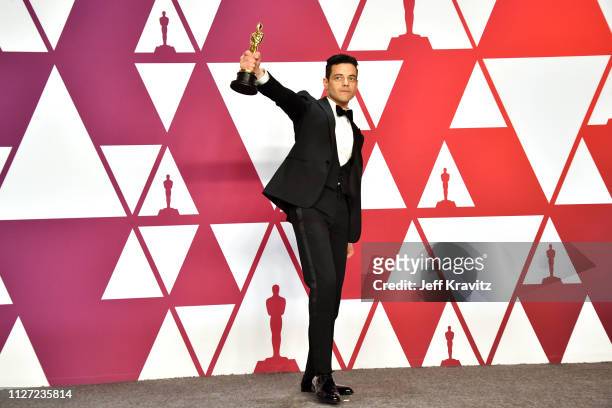 Rami Malek poses with the Best Actor award for "Bohemian Rhapsody" in the press room during at Hollywood and Highland on February 24, 2019 in...
