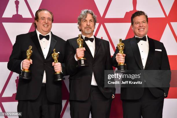 Nick Vallelonga, Peter Farrelly and Brian Currie poses with the Best Picture and Best Original Screenplay award for "Green Book" in the press room...