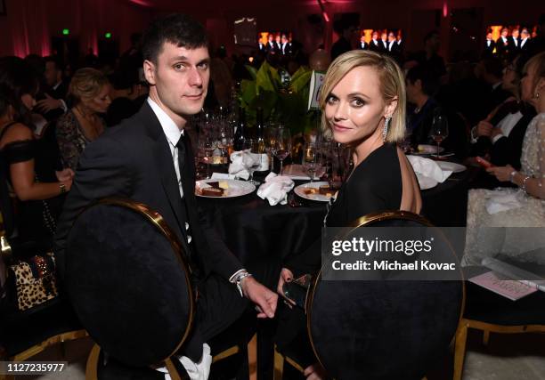 James Heerdegen and Christina Ricci attend the 27th annual Elton John AIDS Foundation Academy Awards Viewing Party sponsored by IMDb and Neuro Drinks...