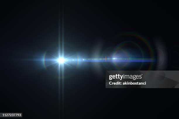 lens flare, ruimte licht, abstracte zwarte achtergrond - affakkelen stockfoto's en -beelden