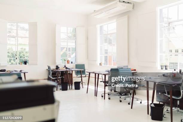 chairs and tables are arranged in office - empty desk stock pictures, royalty-free photos & images