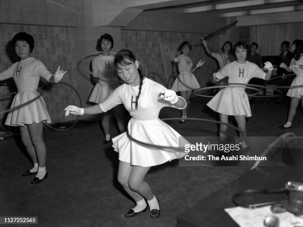 Hula hoops are demonstrated on October 18, 1958 in Tokyo, Japan.
