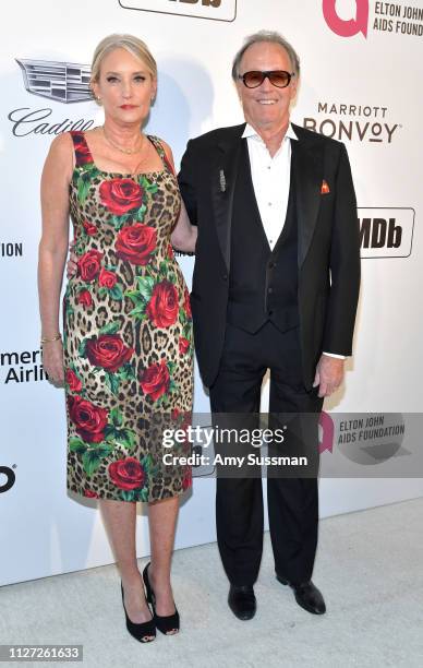 Margaret DeVogelaere and Peter Fonda attend the 27th annual Elton John AIDS Foundation Academy Awards Viewing Party celebrating EJAF and the 91st...