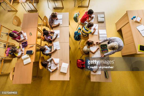 above view of a class at elementary school. - elemntary stock pictures, royalty-free photos & images