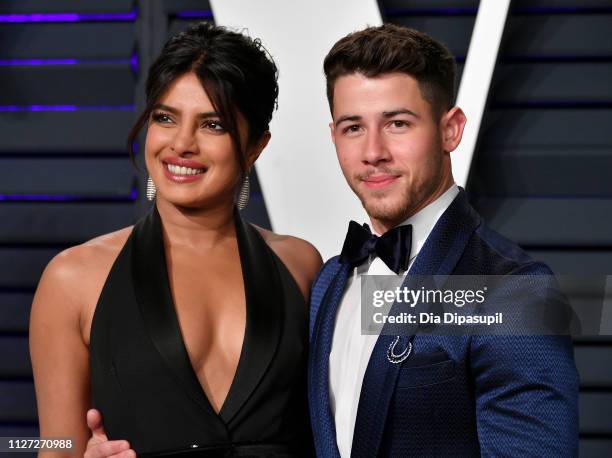 Priyanka Chopra and Nick Jonas attend the 2019 Vanity Fair Oscar Party hosted by Radhika Jones at Wallis Annenberg Center for the Performing Arts on...