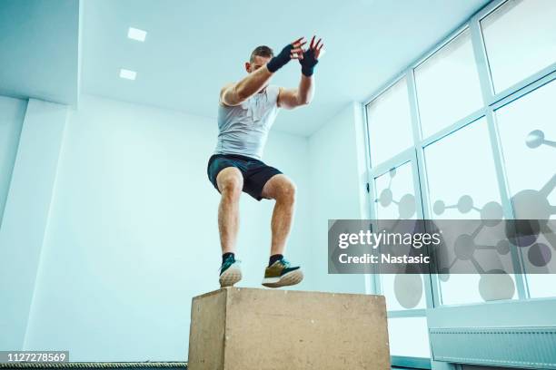 Boxed Getting Up Strong Man Lifting Box Photos and Premium High Res Pictures - Getty Images