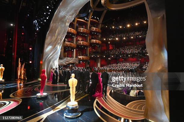 In this handout provided by A.M.P.A.S., The crew of "Green Book" react onstage after winning the Best Picture award during the 91st Annual Academy...