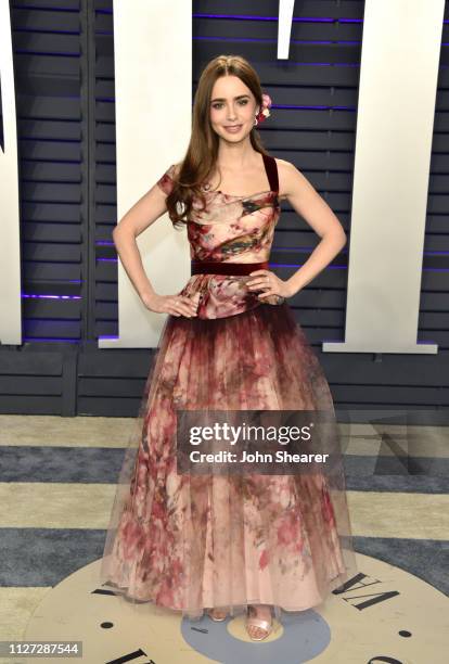 Lily Collins attends the 2019 Vanity Fair Oscar Party hosted by Radhika Jones at Wallis Annenberg Center for the Performing Arts on February 24, 2019...