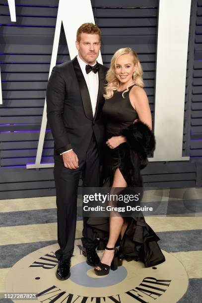 David Boreanaz and Jaime Bergman attend the 2019 Vanity Fair Oscar Party hosted by Radhika Jones at Wallis Annenberg Center for the Performing Arts...