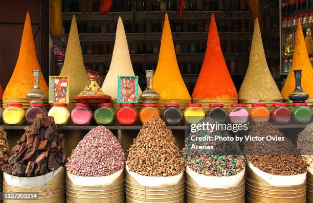 multi colored array of spices in the market of the medina of marrakech, morocco - marrakech spice bildbanksfoton och bilder