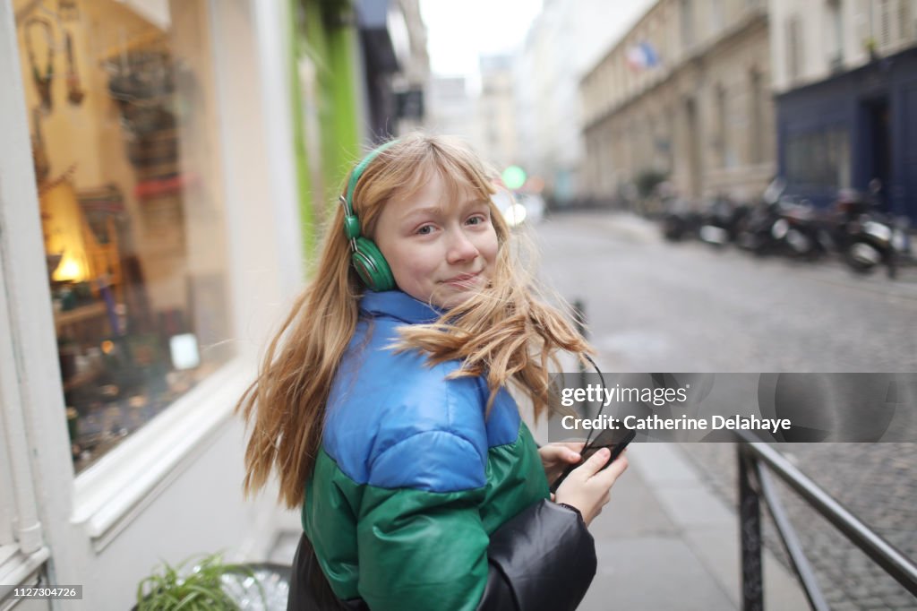 A 12 years old girl in the streets of Paris