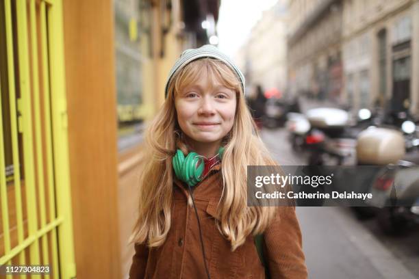 a 12 years old girl in the streets of paris - 12 years old girls ストックフォトと画像