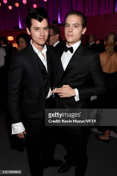 Cole Sprouse and Dylan Sprouse attend the 2019 Vanity Fair Oscar Party hosted by Radhika Jones at Wallis Annenberg Center for the Performing Arts on...
