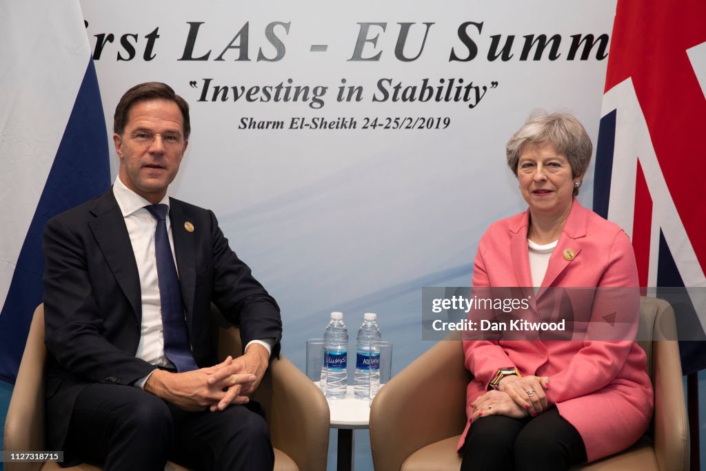 Theresa May Attends The First Arab-European Summit - Day Two