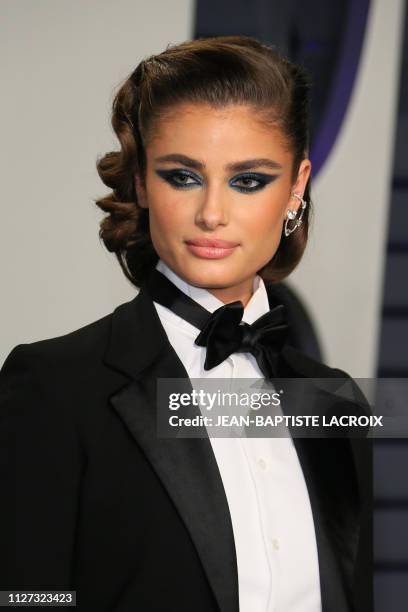 Model Taylor Hill attends the 2019 Vanity Fair Oscar Party following the 91st Academy Awards at The Wallis Annenberg Center for the Performing Arts...
