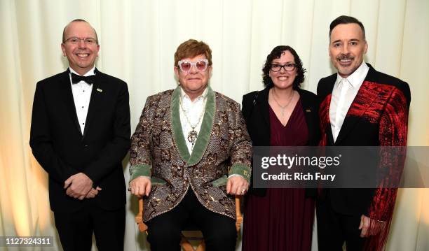 Col Needham, Sir Elton John, Karen Needham, David Furnish attend the 27th annual Elton John AIDS Foundation Academy Awards Viewing Party sponsored by...