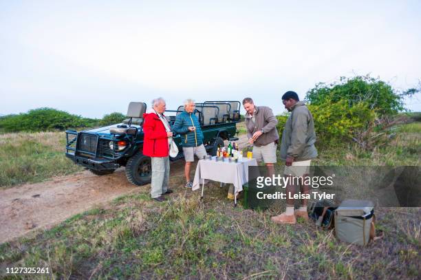 Tourists stop for cocktails while on safari at the Phinda Private Game Reserve, an andBeyond owned nature reserve in eastern South Africa. Hotel and...