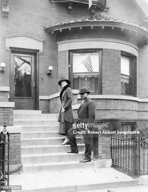 View of Robert Sengstacke Abbott and his wife Helen, at their house on 4847 Champlain Avenue, Chicago, IL, 1918. Sengstacke founded the Chicago...