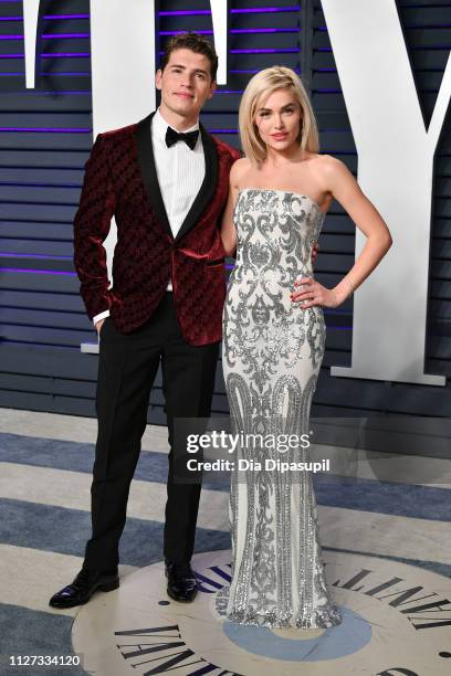 Gregg Sulkin and Michelle Randolph attend the 2019 Vanity Fair Oscar Party hosted by Radhika Jones at Wallis Annenberg Center for the Performing Arts...