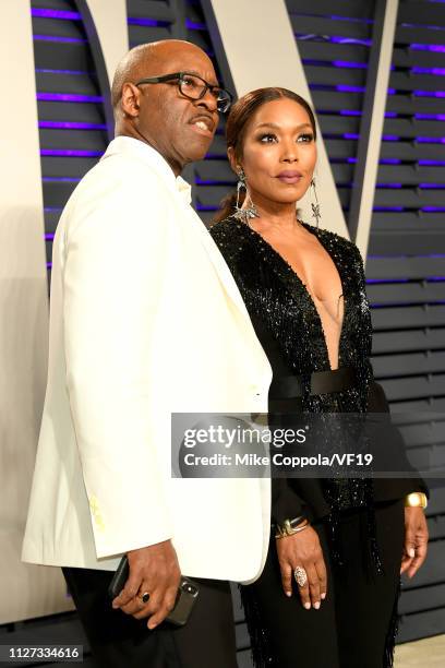 Courtney B. Vance and Angela Bassett attend the 2019 Vanity Fair Oscar Party hosted by Radhika Jones at Wallis Annenberg Center for the Performing...