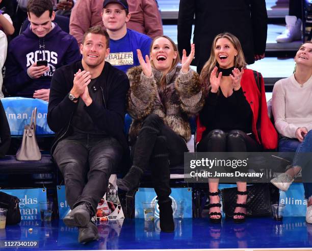 David Lee, Caroline Wozniacki and guest attend San Antonio Spurs v New York Knicks game at Madison Square Garden on February 24, 2019 in New York...