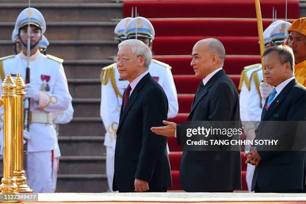 Cambodian King Norodom Sihamoni welcomes Vietnamese President Nguyen Phu Trong during arrival ceremony at the Royal Palace in Phnom Penh on February...