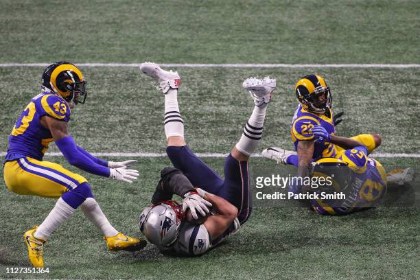 Rob Gronkowski of the New England Patriots catches a 29-yard reception in the fourth quarter against the Los Angeles Rams during Super Bowl LIII at...