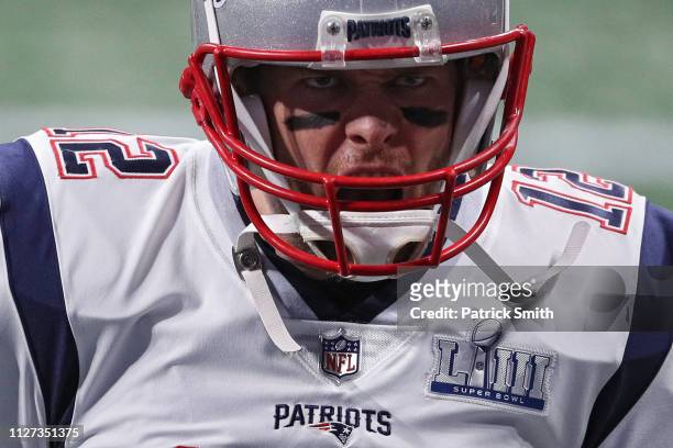 Tom Brady of the New England Patriots warms up prior to Super Bowl LIII against the Los Angeles Rams at Mercedes-Benz Stadium on February 03, 2019 in...