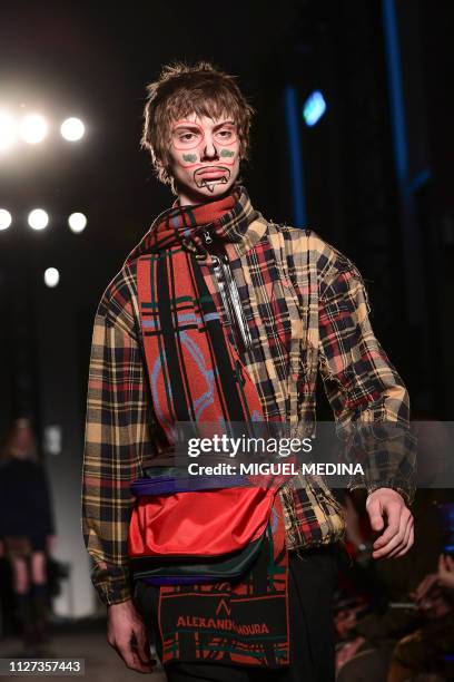 Model presents a creation by Alexandra Moura during the women's Fall/Winter 2019/2020 collection fashion show, on February 25, 2019 in Milan.