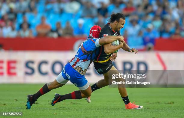 Schalk Brits of the Vodacom Bulls tackles Dillyn Leyds of the DHL Stormers during the Super Rugby match between Vodacom Bulls and DHL Stormers at...