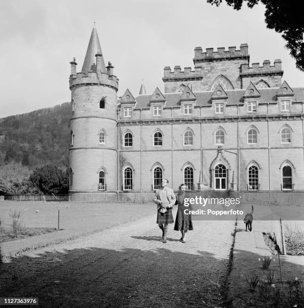 Ian Campbell, 11th Duke of Argyll and Margaret Campbell, Duchess of Argyll pictured together strolling in the grounds of Inveraray Castle, the seat...
