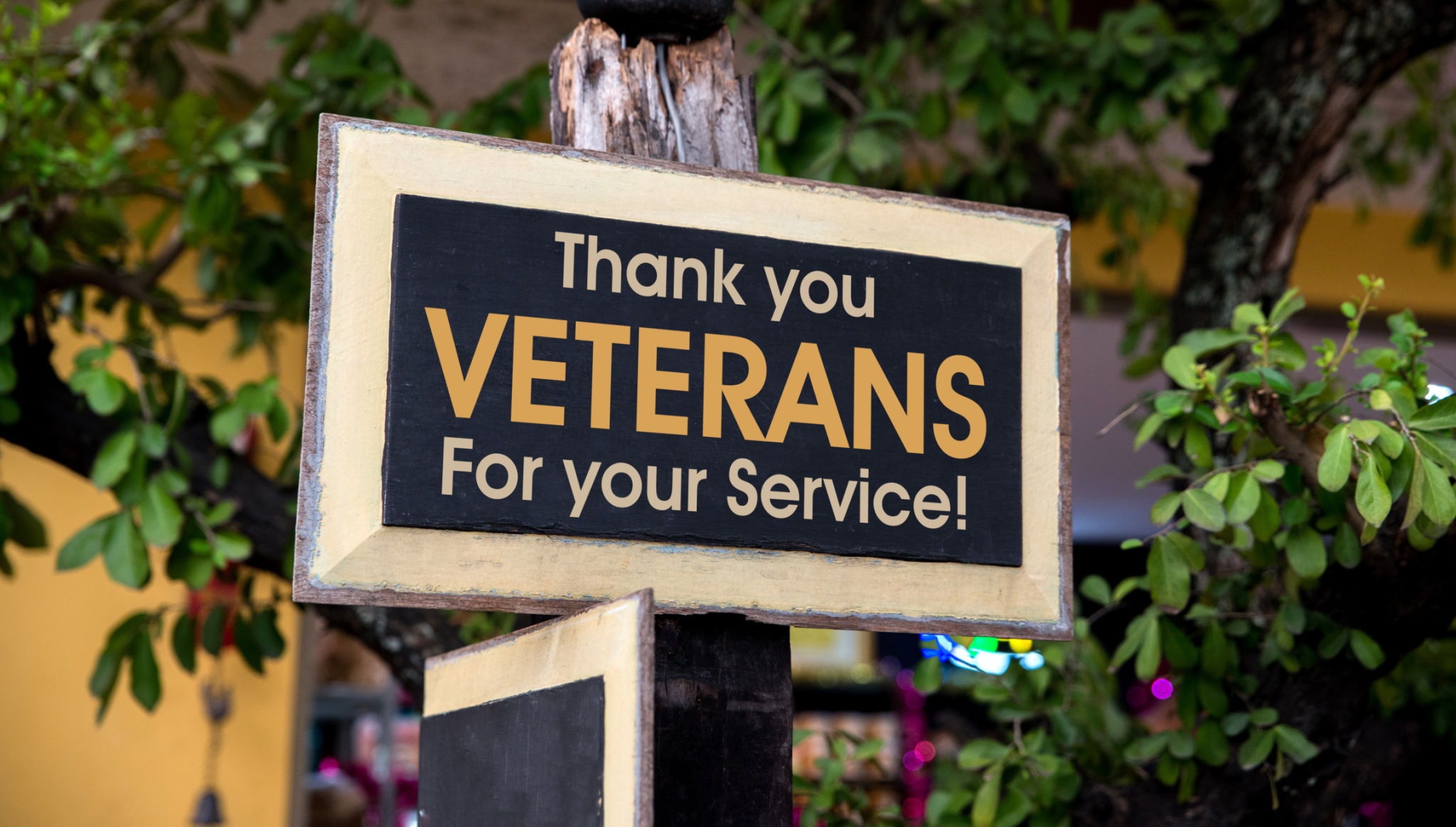 Thank you Veterans written on a Wooden Sign Board Thank you Veterans written on a Wooden Sign Board