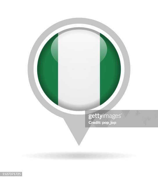 nigeria - vector round flag pin glossy icon - nigerian flag stock illustrations