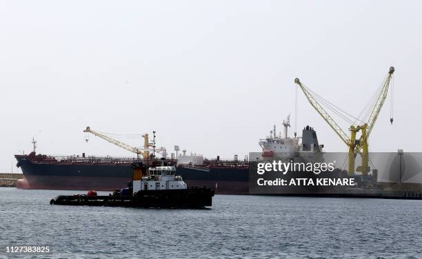 The Iran-flagged oil tanker ship Clavel is docked at Shahid Beheshti Port in the southeastern Iranian coastal city of Chabahar, on the Gulf of Oman,...