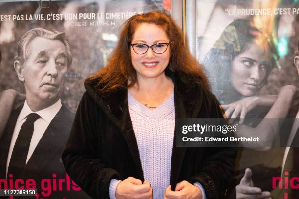 Carrie Mitchum attends the "Nice Girls Don't Stay For Breakfast" Photocall at Mk2 Bibliotheque on February 04, 2019 in Paris, France.