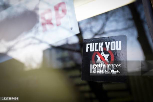 The office of the civic action committee Obywatele RP is seen besmirched with hate propaganda including anti-Semitic messages and white power symbols...